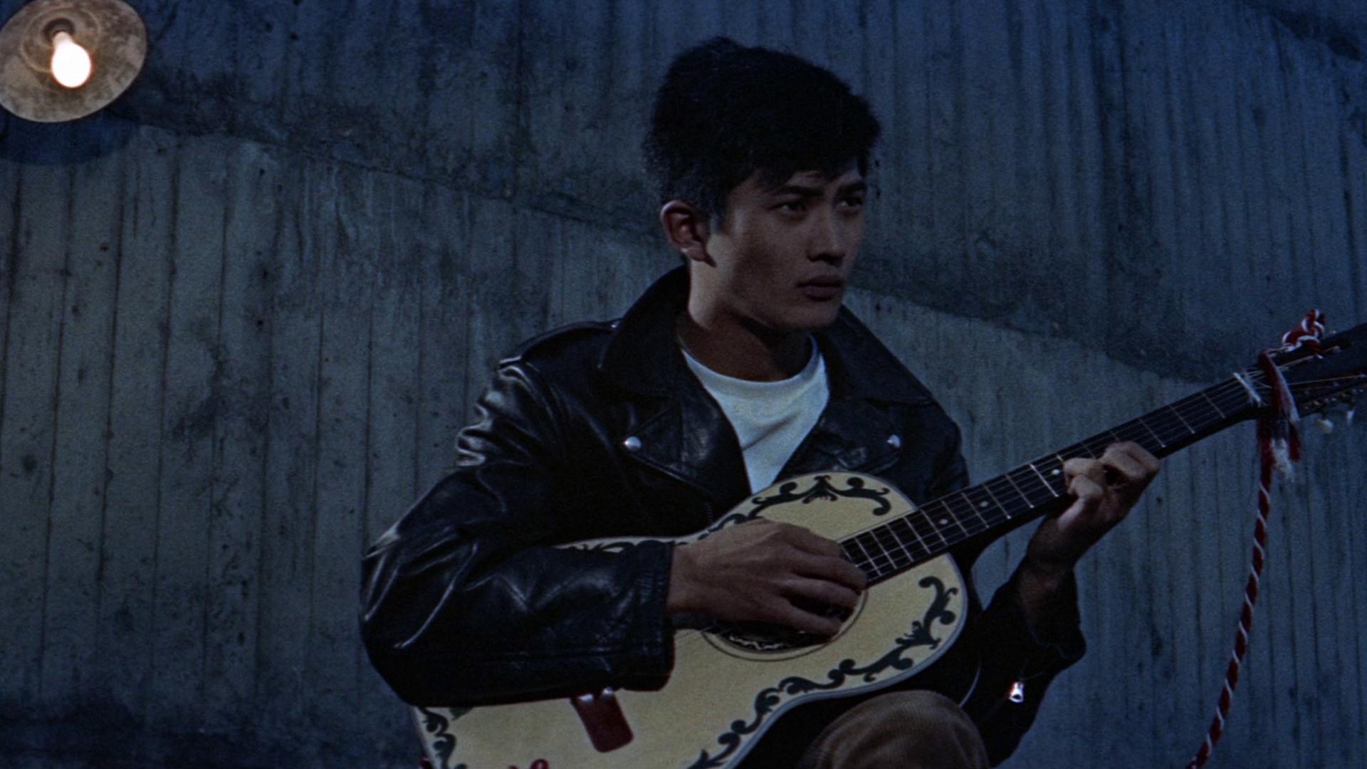 ギターを持った渡り鳥